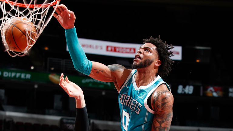 APRIL 22: Miles Bridges #0 of the Charlotte Hornets dunks the ball during the game against the Chicago Bulls on April 22, 2021 at United Center in Chicago, Illinois.