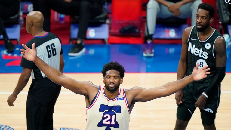 Philadelphia 76ers&#39; Joel Embiid (21) celebrates after scoring during the second half of an NBA basketball game against the Brooklyn Nets, Wednesday, April 14, 2021, in Philadelphia. (AP Photo/Matt Slocum)

