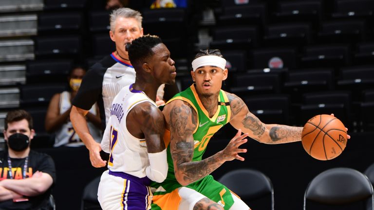 Jazz guard Jordan Clarkson backs down the Lakers' fiery point guard Dennis Schroder