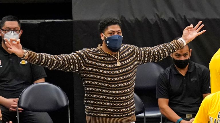 Los Angeles Lakers forward Anthony Davis gestures while watching the second half of the team&#39;s NBA basketball game against the Utah Jazz on Wednesday, Feb. 24, 2021, in Salt Lake City. (AP Photo/Rick Bowmer)


