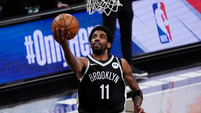 Brooklyn Nets guard Kyrie Irving goes to the basket during the second half of an NBA basketball game against the Boston Celtics, Friday, April 23, 2021, in New York. (AP Photo/Mary Altaffer)


