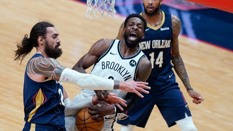 Brooklyn Nets forward Jeff Green is fouled by New Orleans Pelicans center Steven Adams as he goes to the basket in the first half of an NBA basketball game in New Orleans, Tuesday, April 20, 2021.