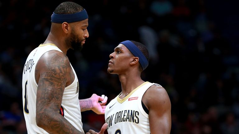 DeMarcus Cousins and Rajon Rondo playing for the New Orleans Pelicans during the 17-18 season