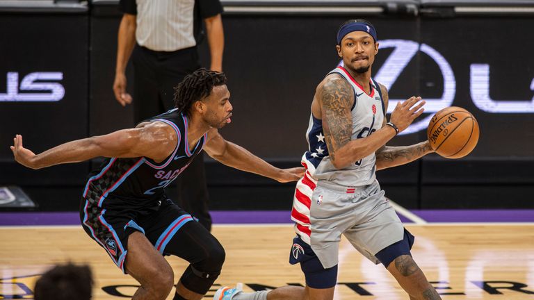 Washington Wizards guard Bradley Beal (3) looks to make a play as he&#39;s defended by Sacramento Kings guard Buddy Hield (24) during the second quarter of an NBA basketball game in Sacramento, Calif., Wednesday, April 14, 2021. (AP Photo/Hector Amezcua)


