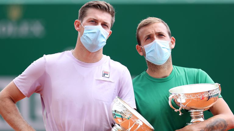 Neal Skupski and Dan Evans of Great Britain pose with their runners up trophies after the Mens Doubles Final match on day eight of the Rolex Monte-Carlo Masters at Monte-Carlo Country Club on April 18, 2021 (Photo by Alexander Hassenstein/Getty Images)