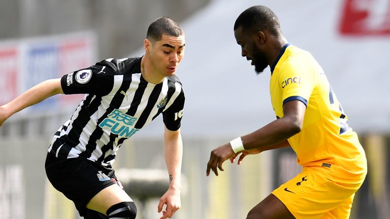 Newcastle's Miguel Almiron duels for the ball with Tottenham's Tanguy Ndombele