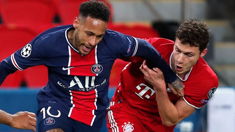 Bayern's Eric Maxim Choupo-Moting, left, Bayern's Benjamin Pavard, right, and PSG's Neymar challenge for the ball during the Champions League, second leg, quarterfinal soccer match between Paris Saint Germain and Bayern Munich at the Parc des Princes stadium, in Paris, France, Tuesday, April 13, 2021. (AP Photo/Francois Mori)