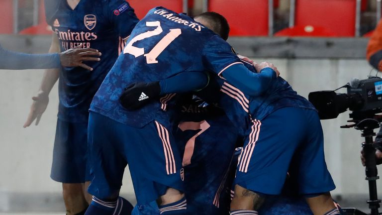 Arsenal players celebrates after Arsenal's Nicolas Pepe scores his side's opening goal during the Europa League quarter final second leg soccer match between Slavia Prague and Arsenal