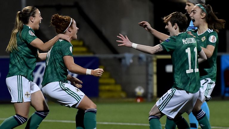 BELFAST, NORTHERN IRELAND - APRIL 13: Marissa Callaghan of Northern Ireland celebrates with teammates after scoring their team's first goal during the UEFA Women's Euro 2022 Play-off match between Northern Ireland and Ukraine at Seaview on April 13, 2021 in Belfast, Northern Ireland. Sporting stadiums around the UK remain under strict restrictions due to the Coronavirus Pandemic as Government social distancing laws prohibit fans inside venues resulting in games being played behind closed doors. 