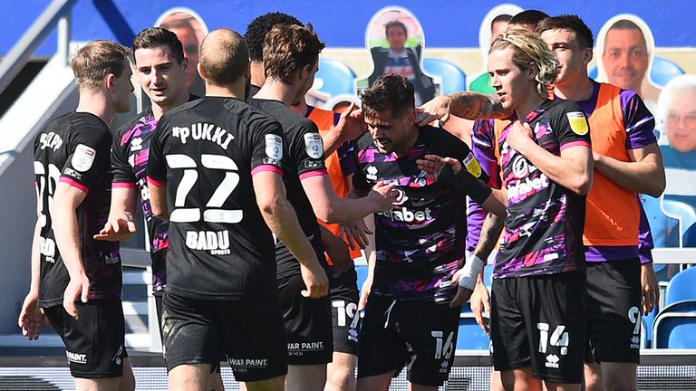 Norwich City's Xavi Quintilla celebrates with his team-mates after scoring