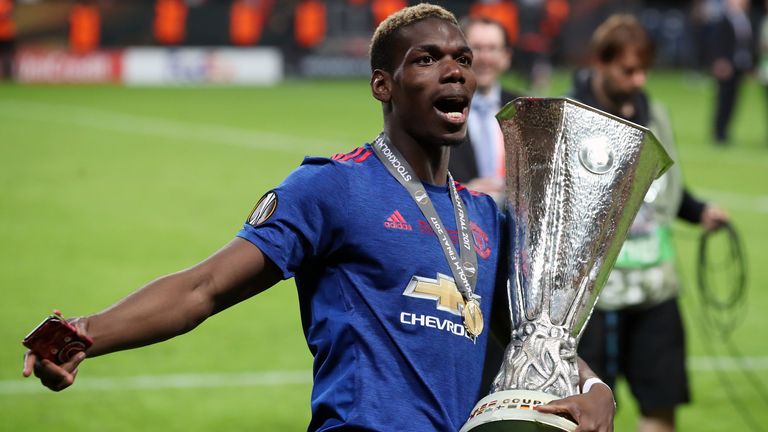 Paul Pogba celebrates Manchester United's 2017 Europa League victory in Stockholm