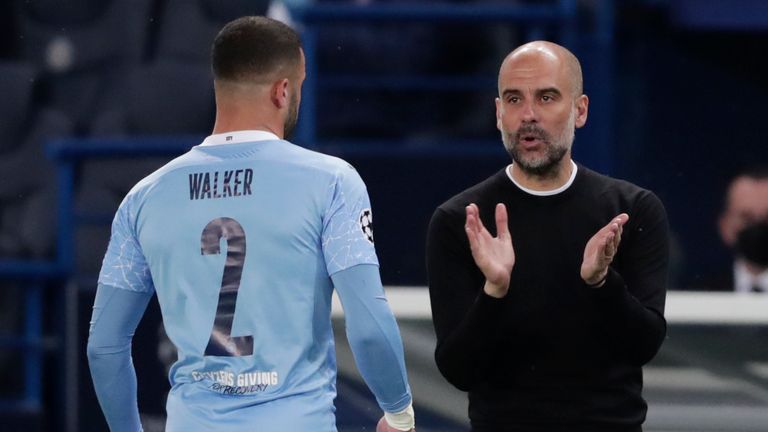 Pep Guardiola gives encouragement to Kyle Walker during the first leg against PSG