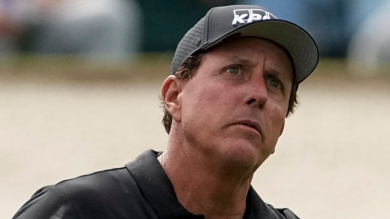 Phil Mickelson watches his tee shot on the third hole during the second round of the Masters golf tournament on Friday, April 9, 2021, in Augusta, Ga. (AP Photo/Charlie Riedel)
