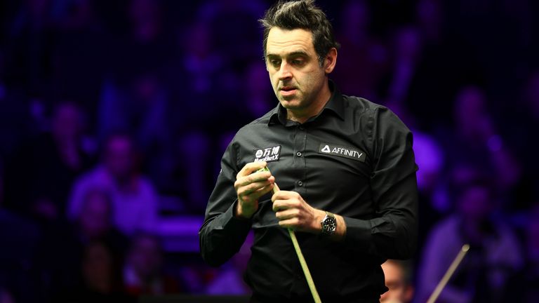 Ronnie O'Sullivan of England considers a shot to Anthony Hamilton of England at the third round of 2020 Welsh Open in Cardiff, the United Kingdom, 13 February 2020. Ronnie O'Sullivan of England defeated Anthony Hamilton of England with 4-2. (Imaginechina via AP Images)