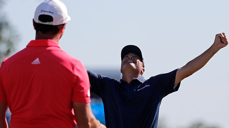 Ryan Palmer throws his arms in the air as he celebrates with teammate Jon Rahm as they win the PGA Zurich Classic golf tournament at TPC Louisiana in Avondale, La., Sunday, April 28, 2019. (AP Photo/Gerald Herbert)