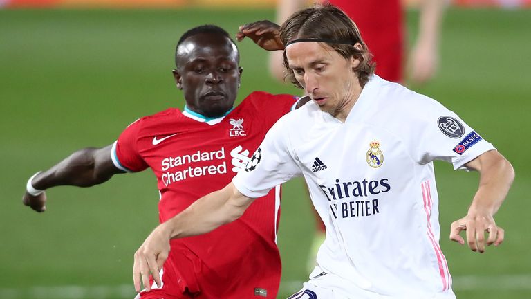 Sadio Mane and Luka Modric battle for possession during Real Madrid vs Liverpool in the Champions League