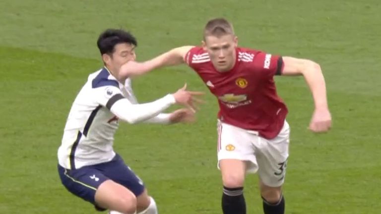 Scott McTominay was penalised for this stray arm on Heung-min Son in the build-up to Edinson Cavani's goal