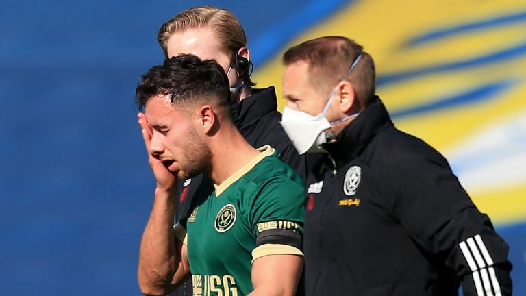 George Baldock was brought off after suffering a head injury during the game at Elland Road