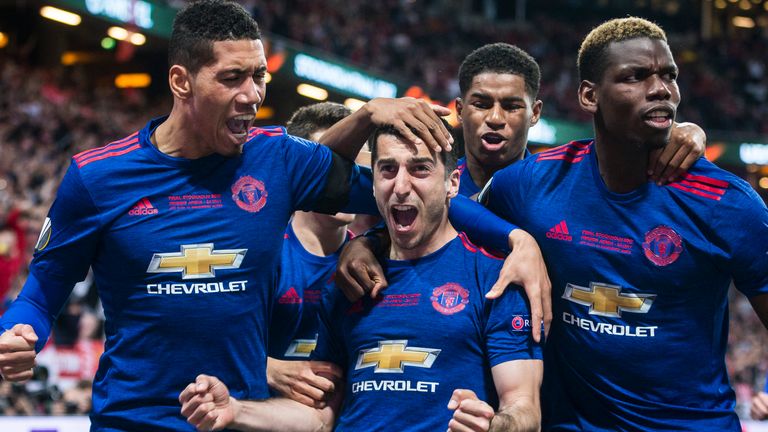 Chris Smalling congratulates Henrikh Mkhitaryan after he scores Manchester United's second goal in the 2017 Europa League final victory over Ajax