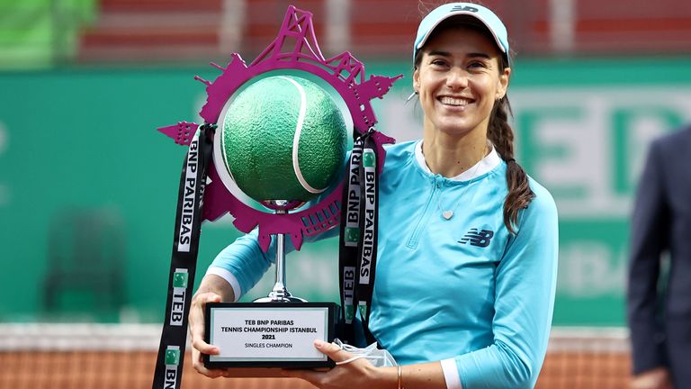 Romanian tennis player Sorana Cirstea celebrates as she lifts the cup after winning the final match against Belgian tennis player Elise Mertens (not seen) during TEB BNP Paribas Tennis Championship in Istanbul, Turkey on April 25, 2021. (Photo by Onur Coban/Anadolu Agency via Getty Images)