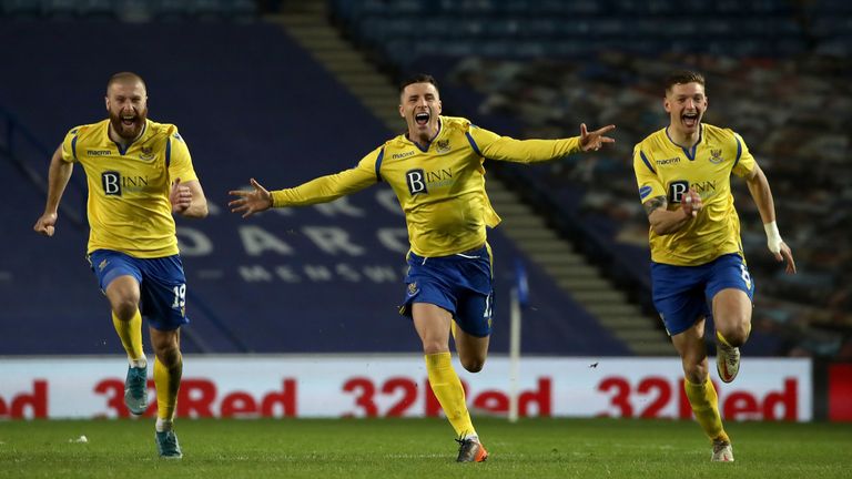 St Johnstone players celebrate their penalty shoot-out win at Ibrox