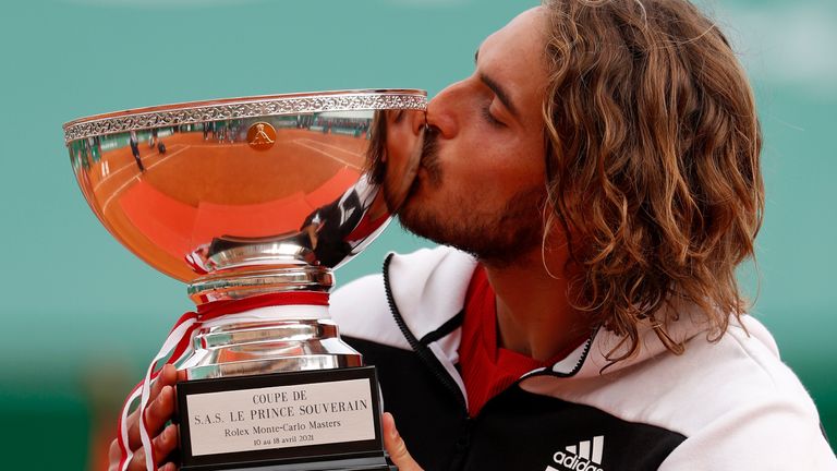 Stefanos Tsitsipas of Greece kisses the trophy after defeating Andrey Rublev of Russia in the Monte Carlo Tennis Masters tournament finals in Monaco, Sunday, April 18, 2021. (AP Photo/Jean-Francois Badias)