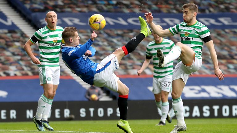 Rangers' Steven Davis (centre) scores his side's first goal vs Celtic in the Scottish Cup