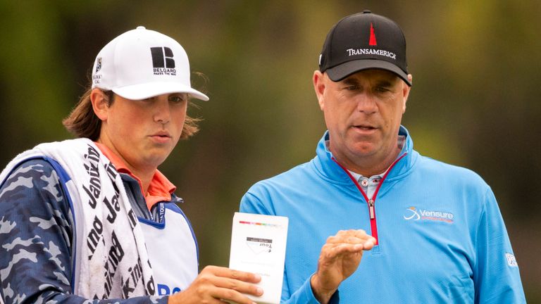 Cink has his son, Reagan, on his bag