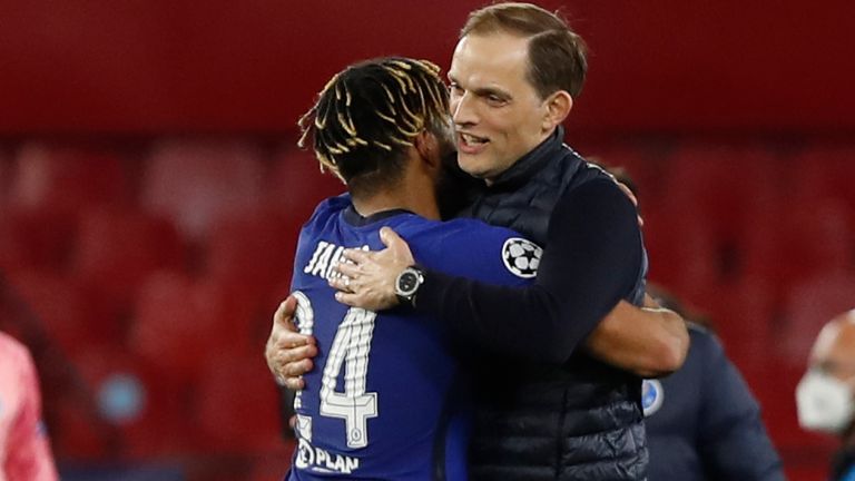 Chelsea's head coach Thomas Tuchel, right, celebrates with Chelsea's Reece James at the end of the Champions League quarter final second leg soccer match between Chelsea and Porto at the Ramon Sanchez Pizjuan stadium, in Seville, Spain, Tuesday, April 13, 2021. (AP Photo/Angel Fernandez)