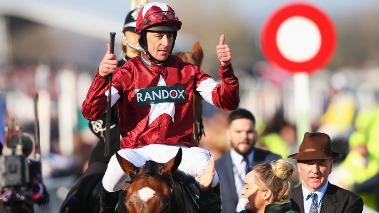 Davy Russell and Tiger Roll celebrate their Grand National win