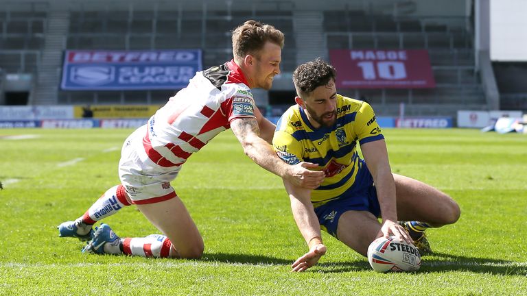 Warrington Wolves v Leigh Centurions - Betfred Super League - Totally Wicked Stadium
Warrington Wolves&#39; Toby King (right) scores his side&#39;s sixth try of the game during the Betfred Super League match at The Totally Wicked Stadium, St Helens. Picture date: Friday April 2, 2021.
