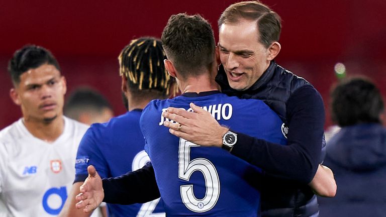 SEVILLE, SPAIN - APRIL 13: Thomas Tuchel, Manager of Chelsea FC and Jorginho of Chelsea FC celebrate following the UEFA Champions League Quarter Final Second Leg match between Chelsea FC and FC Porto at Estadio Ramon Sanchez Pizjuan on April 13, 2021 in Seville, Spain. Sporting stadiums around Spain remain under strict restrictions due to the Coronavirus Pandemic as Government social distancing laws prohibit fans inside venues resulting in games being played behind closed doors. (Photo by Jose M