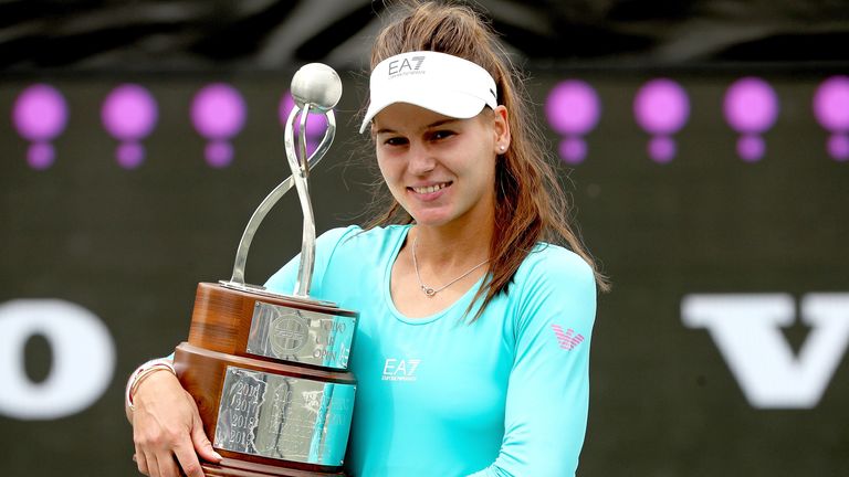 Veronika Kudermetova of Russia poses with the winner's trophy after defeating Danka Kovinic of Montenegro during the final of the Volvo Car Open at LTP Daniel Island Tennis Center on April 11, 2021 in Charleston, South Carolina. (Photo by Matthew Stockman/Getty Images)