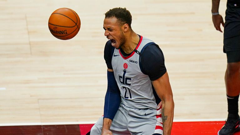 AP - Washington Wizards center Daniel Gafford (21) reacts