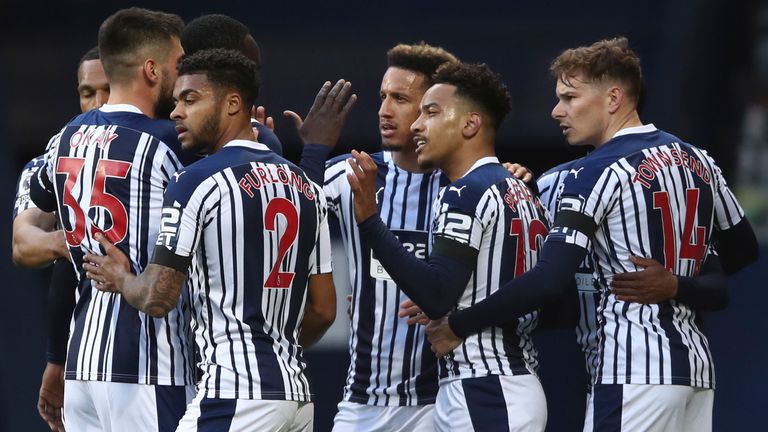 West Bromwich Albion's Matheus Pereira, 2nd right, celebrates with team mates after scoring his side's opening goal during an English Premier League soccer match between West Bromwich Albion and Southampton at The Hawthorns in West Bromwich, England, Monday April 12, 2021. (Tim Goode/Pool via AP)