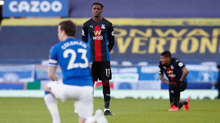 Wilfried Zaha opts against taking a knee ahead of Crystal Palace&#39;s Premier League clash with Everton. (Darren Staples/Sportimage via AP Images)  