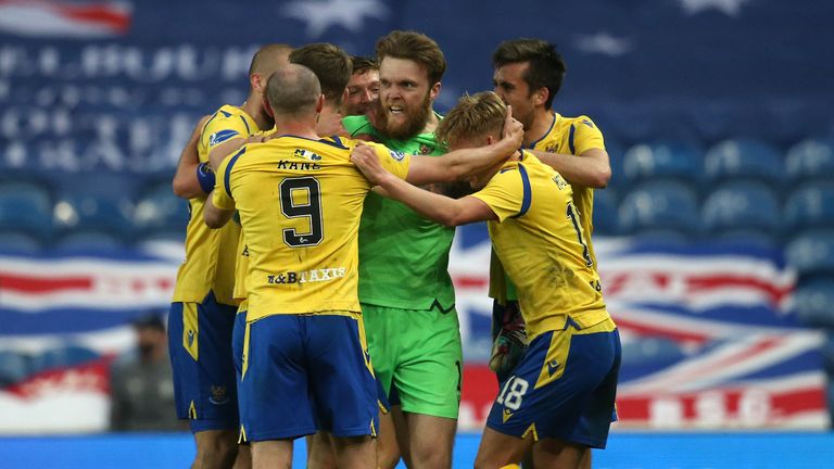 St Johnstone goalkeeper Zander Clark celebrates after his header comes off team-mate Christopher Kane