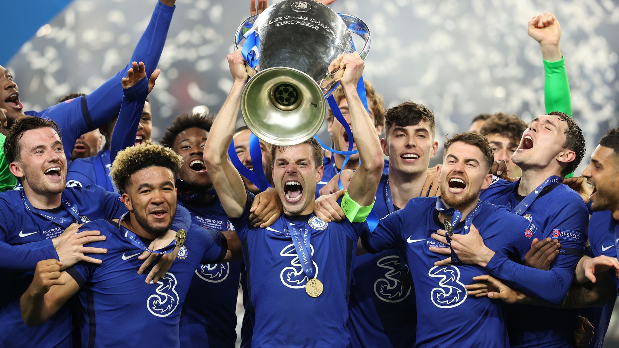 Porto players celebrate as they lift the trophy after beating