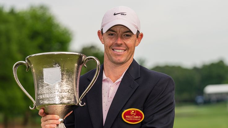 Rory McIlroy holds the trophy after winning during the fourth round of the Wells Fargo Championship golf tournament at Quail Hollow on Sunday, May 9, 2021, in Charlotte, N.C. (AP Photo/Jacob Kupferman)