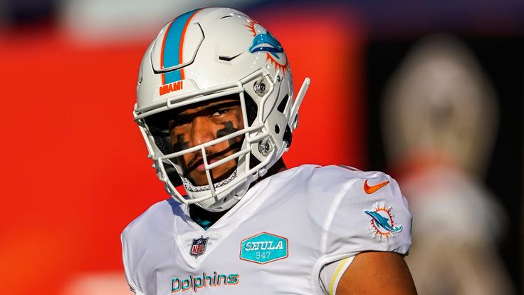 Miami Dolphins quarterback Tua Tagovailoa (1) looks on against the Denver Broncos. (AP Photo/Jack Dempsey)
