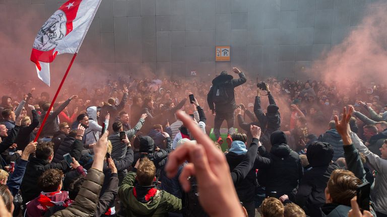 Ajax supporters celebrate as their team secured the Eredivisie title