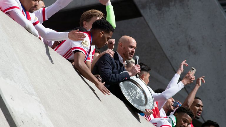 Ajax coach Erik ten Hag and his players celebrate clinching the title