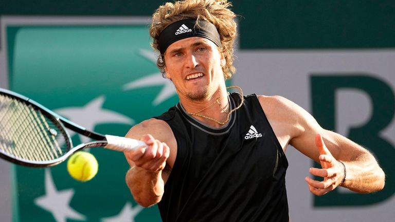 Alexander Zverev returns the ball to compatriot Oscar Otte during their first round match of the French Open tennis tournament at the Roland Garros stadium Sunday, May 30, 2021 in Paris. (AP Photo/Michel Euler)