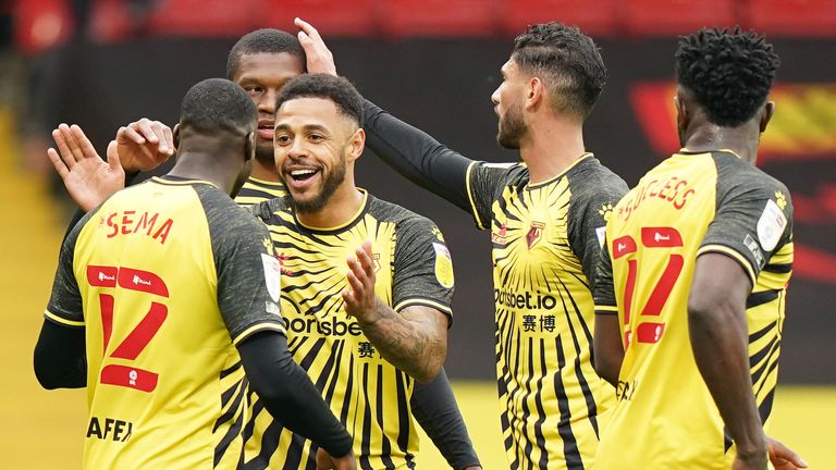 Watford's Andre Gray (centre) celebrates scoring his side's first goal of the game