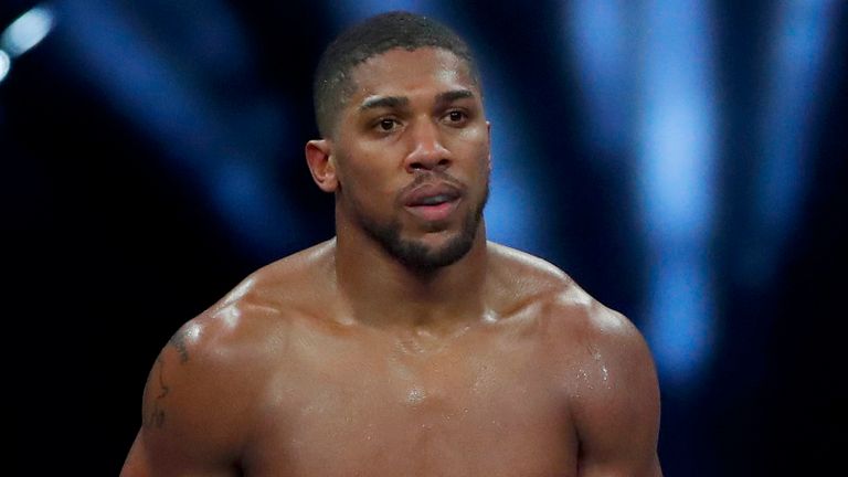 Anthony Joshua says he is "tired" over implied inaction from Fury's camp over finalising terms over their summer bout in Saudi Arabia