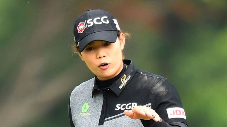 Ariya Jutanugarn of Thailand reacts after a successful shot on 18th hole during the final round of the LPGA Honda Thailand golf tournament in Pattaya, southern Thailand, Sunday, May 9, 2021.(AP Photo/Kittinun Rodsupan).