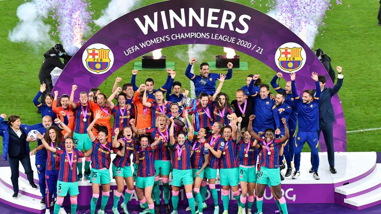 Barcelona players hold the trophy aloft after the UEFA Women's Champions League final against Chelsea