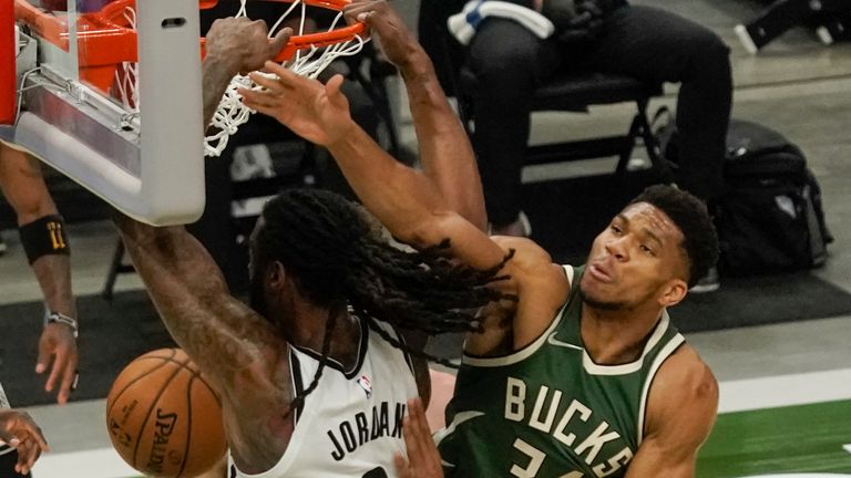 Giannis Antetokounmpo contributed an incredible 49 points as Milwaukee edged out Brooklyn in Sunday&#39;s NBA action.