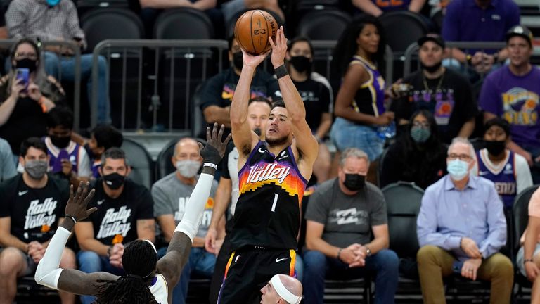 Devin Booker poured in 34 points as Phoenix upset the Los Angeles Lakers in Game 1.