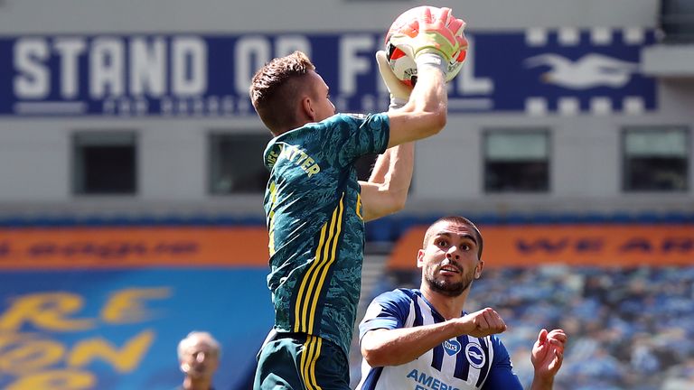 Arsenal goalkeeper Bernd Leno landed awkwardly after a challenge from Brighton's Neal Maupay which lead to him going off injured (PA)